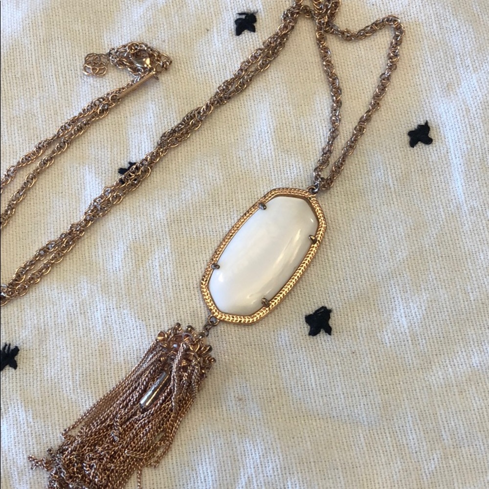 White Kendra Scott necklace with rose gold chain
